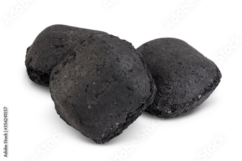 bbq charcoal briquette isolated on white background with clipping path and full depth of field photo