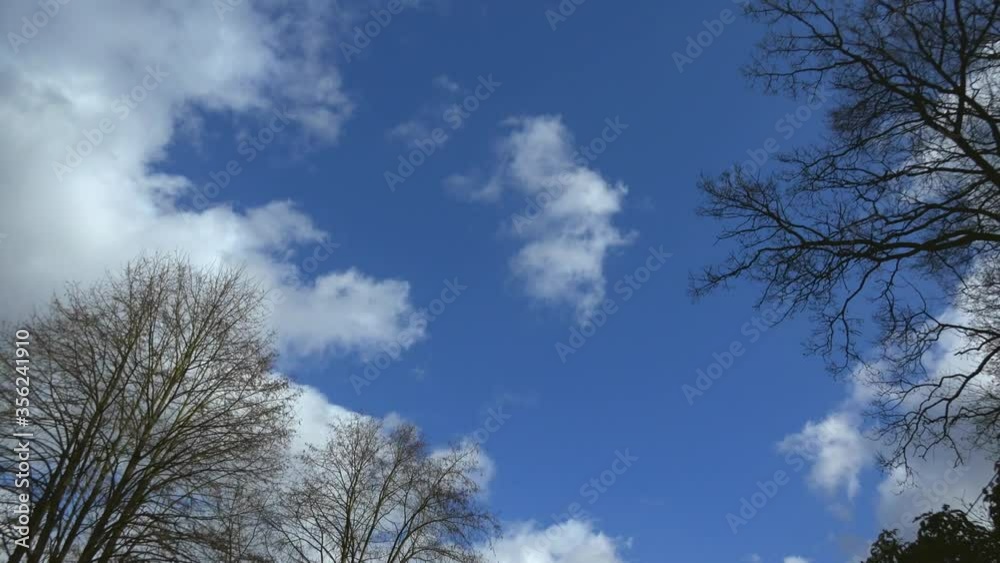 WS LA Fluffy clouds in blue sky / Mettlach, Saarland, Germany WS LA Fluffy clouds in blue sky / Mettlach, Saarland, Germany