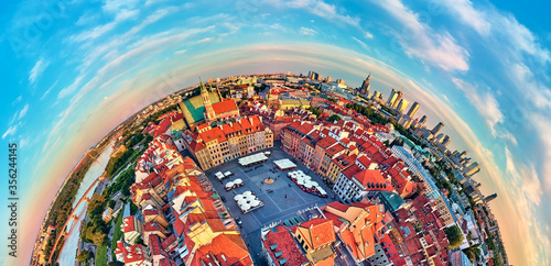 Beautiful panoramic aerial drone view (360 spherical panorama little planet)) on Warsaw Old town (POL: (Stare Miasto), Royal Castle, square and the Column of Sigismund III Vasa at sunset, Poland photo