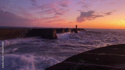 Scenic sunset over Atlantic Ocean. View from Felgueiras Lighthouse in Foz do Douro district of Porto city, Portugal at sundown.