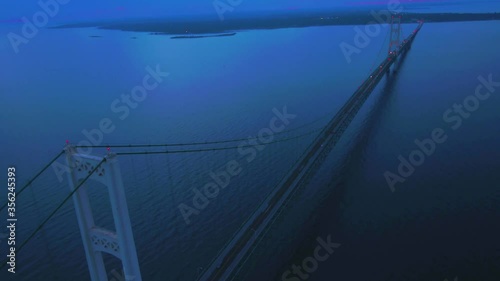 4K Aerial footage of Mackinac Bridge in Michigan during sunset