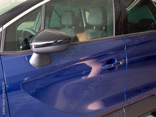 navy blue side view new car
