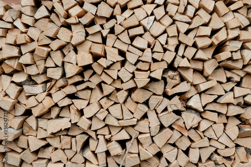 Stacks of Firewood. Preparation of firewood for the winter. Pile of Firewood.Firewood background