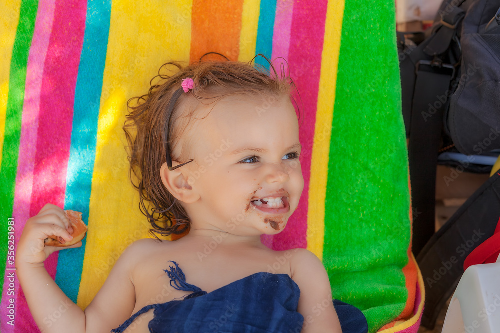 baby eating a donut
