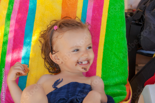 Wallpaper Mural baby eating a donut Torontodigital.ca