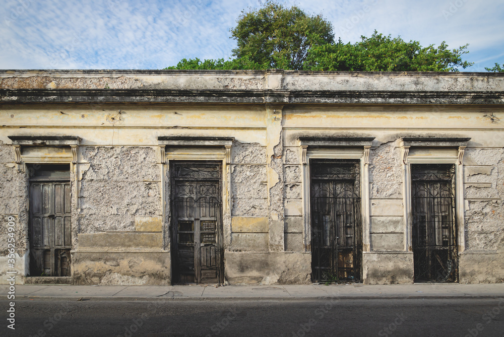 Facade of typical Mexican colonial building in Merida, Yucatan, Mexico