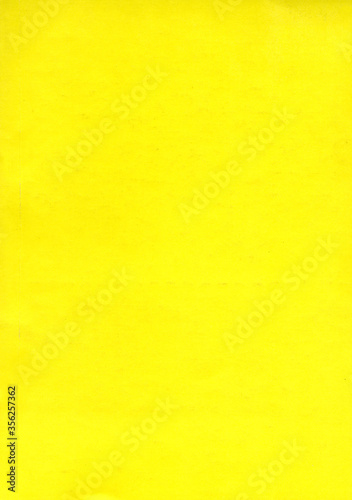 Old yellow paper texture. Rough faded surface. Blank retro page. Empty place for text. Perfect for background and vintage style design.