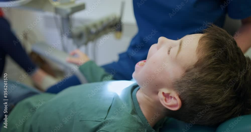 CU Boy (8-9) having dentist appointment / Hove, Sussex, England, United Kingdom CU Boy (8-9) having dentist appointment / Hove, Sussex, England, United Kingdom