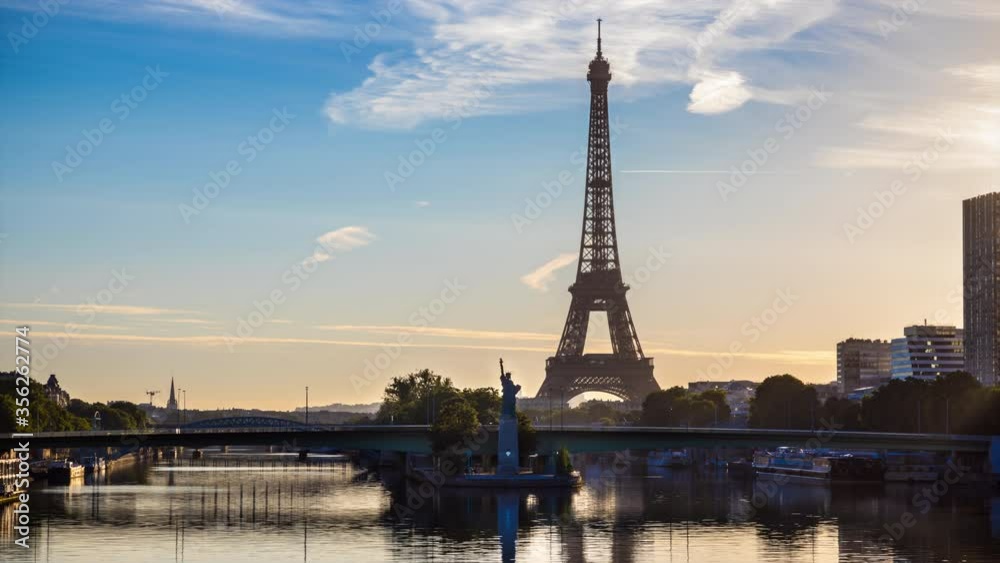 Architecture of Paris with Eiffel Tower, Pont de Grenelle over Seine river and Statue de la Liberte Paris