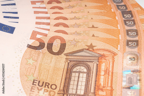 50 euro bills stacked up, slightly out of focus