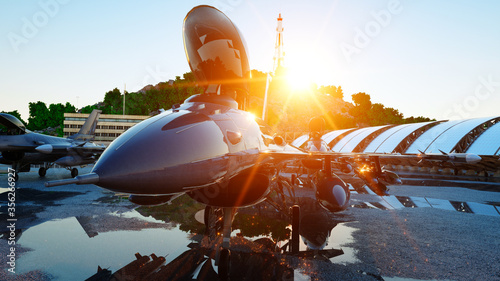 Photos f 16 military fighter jet. military base. sunset. 3d rendering.