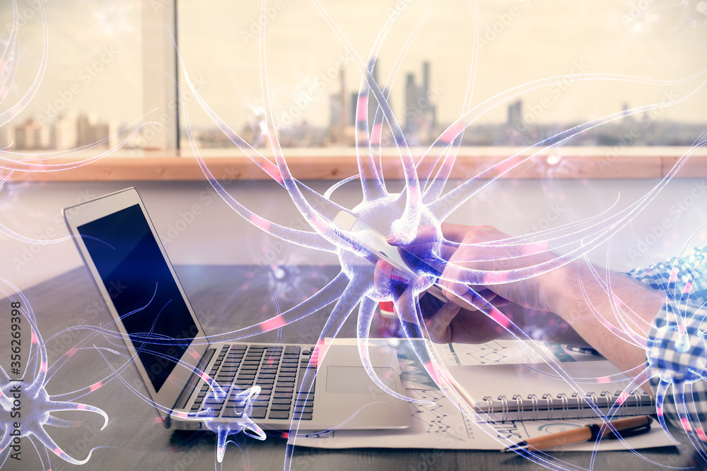 Double exposure of man's hands holding and using a phone and neuron drawing. Education concept.
