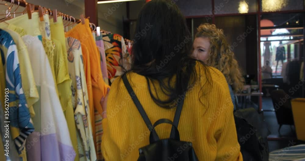 MS TS Women choosing clothing in boutique at King's Cross / London, UK MS TS Women choosing clothing in boutique at King's Cross / London, UK