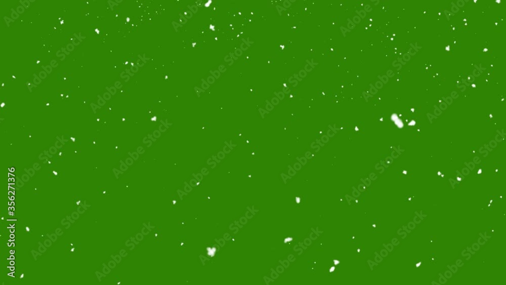 Snow falling on green background Snow falling on green background