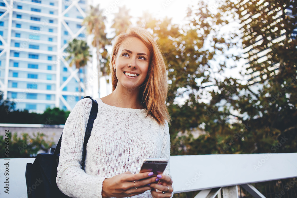 Fototapeta premium Smiling female lawyer is talking on mobile phone about her winning trial