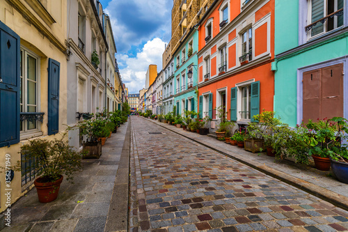 Cremieux Street (Rue Cremieux), Paris, France. Rue Cremieux in the 12th Arrondissement is one of the prettiest residential streets in Paris. Colored houses in Rue Cremieux street in Paris. France. © daliu