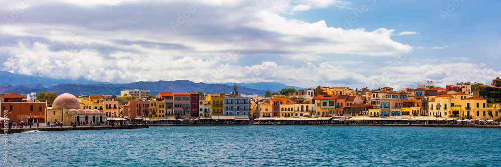 Picturesque old port of Chania. Landmarks of Crete island. Greece. Bay of Chania at sunny summer day, Crete Greece. View of the old port of Chania, Crete, Greece. The port of chania, or Hania.