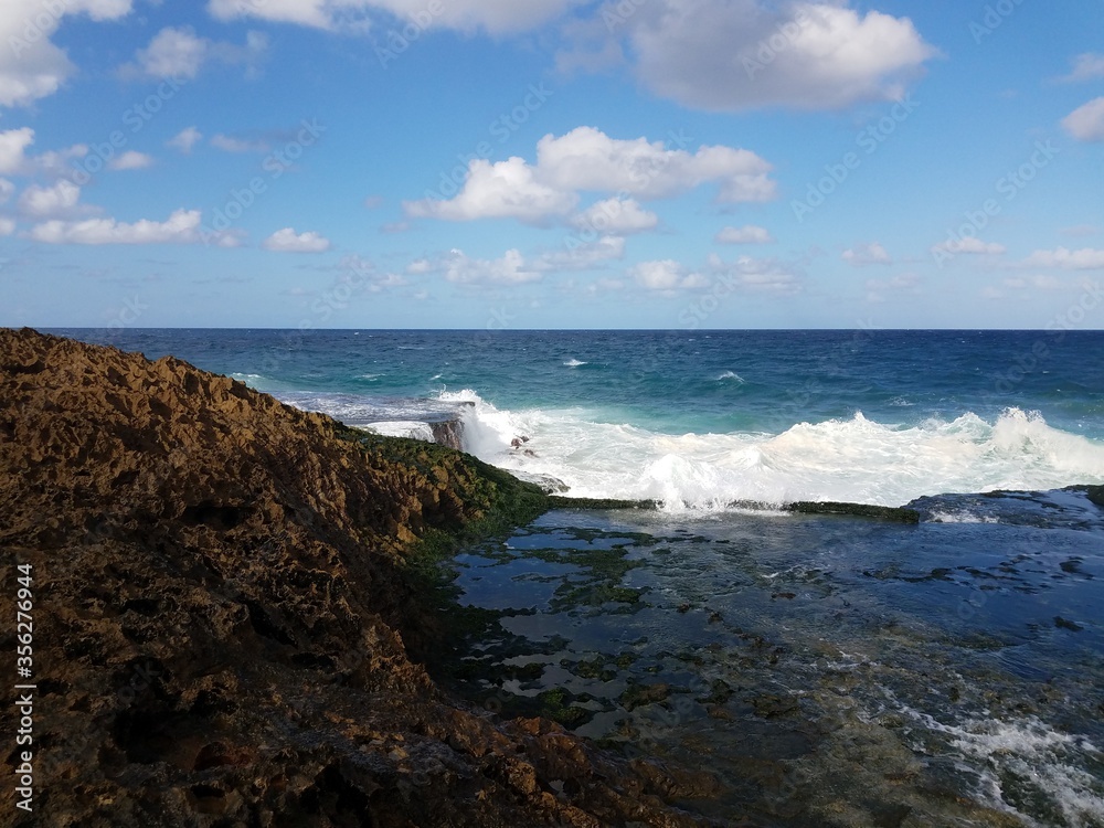 rocky shore with waves in Isabela, Puerto Rico