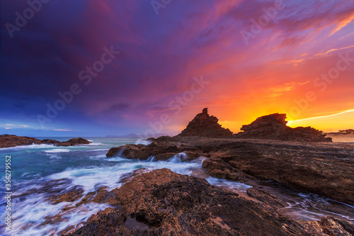 Beautiful vivid coloured sunset , over Wellington Rock. Nambucca Heads ,Mid North Coast of N.S.W. Australia. © Bruce