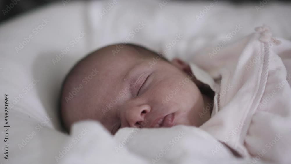 Close up of cute sleeping newborn baby girl. Close up of cute sleeping newborn baby girl.