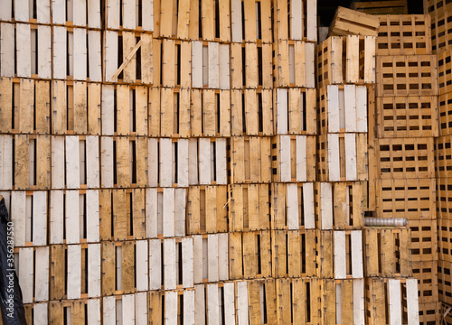 Wooden crates stacked in pile