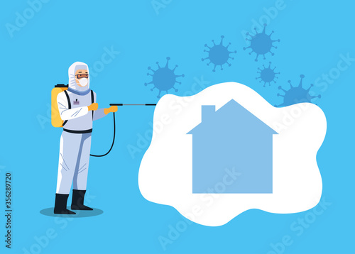 biosafety worker with sprayer disinfectant house for covid19 prevention