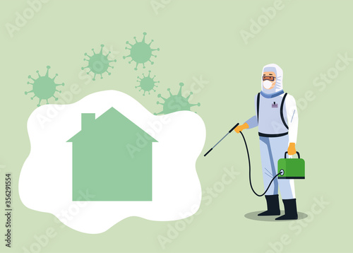 biosafety worker with sprayer disinfectant house for covid19 prevention