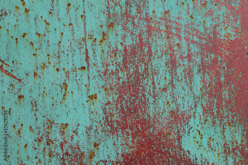 Wall with old paint for backdrop. Weathering, scratches, roughness. Pitting and rust. Color - Shadow Green, Bole, Hue Brown.
