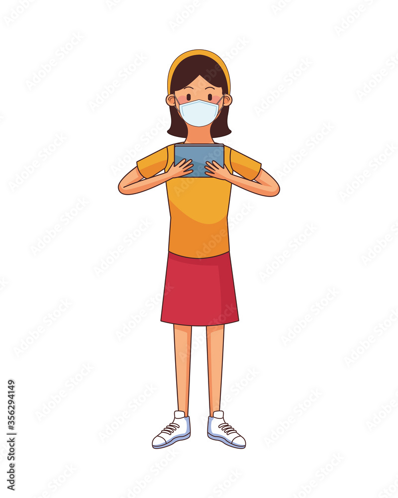 young woman wearing medical mask using tablet
