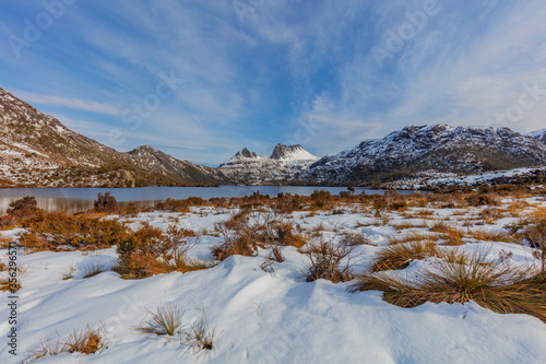 Beautiful evening light over snow covered Cradle Mountain.Cradle Mountain - Lake St Clair National Park.Central Highlands of Tasmania , Australia.
