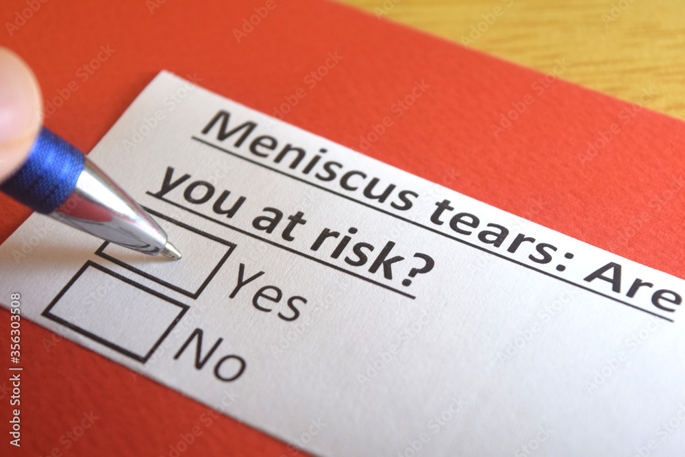 Obraz premium One person is answering question about meniscus tears.