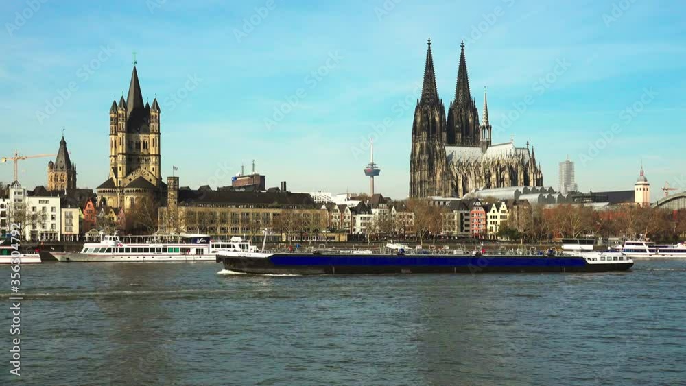 WS Barge on Rhine river, cathedral and Great Saint Martin church / Cologne, North Rhine Westphalia, Germany WS Barge on Rhine river, cathedral and Great Saint Martin church / Cologne, North Rhine Westphalia, Germany