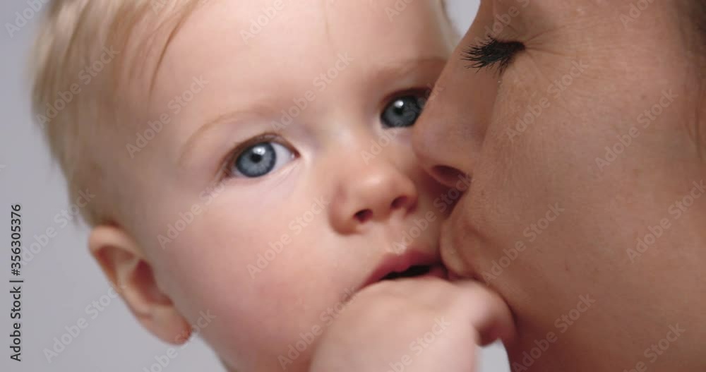 SLO MO CU Mother kissing baby daughter (6-11 months) SLO MO CU Mother kissing baby daughter (6-11 months)