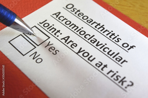 One person is answering question about osteoarthritis of acromioclavicular joint. photo