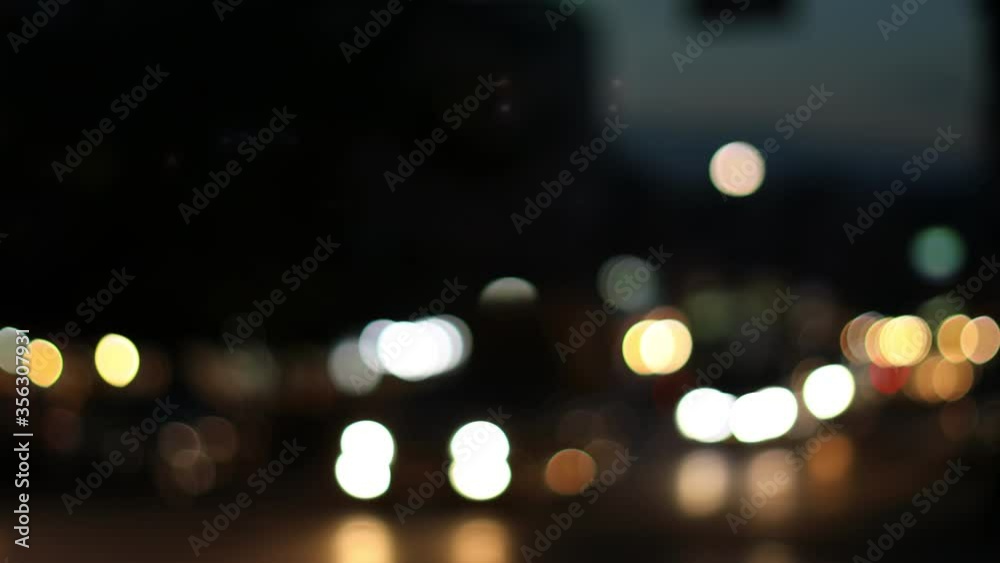 Traffic lights on the road at night on a rainy day, bokeh Traffic lights on the road at night on a rainy day, bokeh