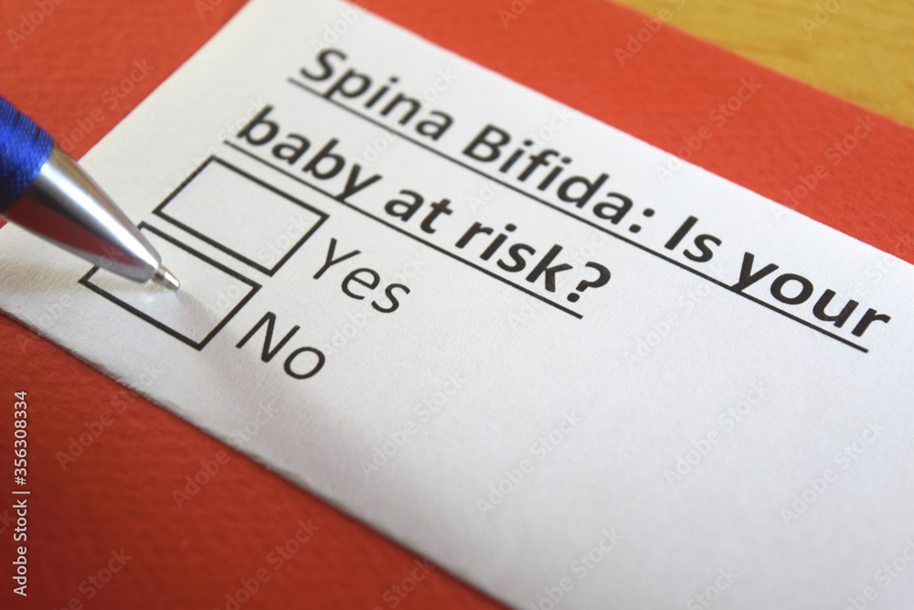 One person is answering question about spina bifida. One person is answering question about spina bifida.