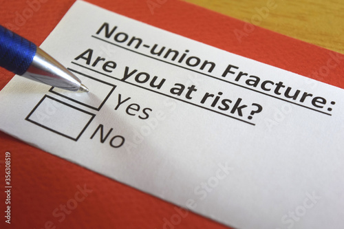 One person is answering question about non union fracture. photo