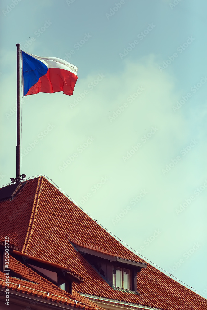 flag of the czech republic on the red roof