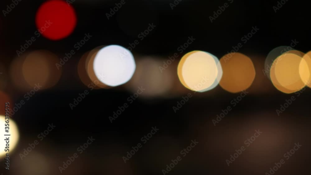 Traffic lights on the road at night on a rainy day, bokeh Traffic lights on the road at night on a rainy day, bokeh