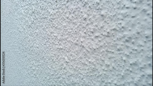 Vignette light grey cement (concrete) wall surface texture for background or wallpaper video in Singapore 