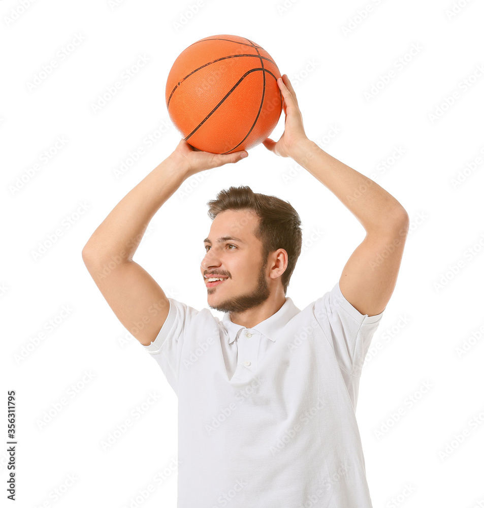 Sporty young man with ball on white background Sporty young man with ball on white background