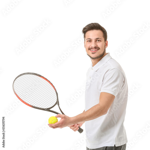 Sporty young tennis player on white background