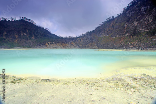 Kawah Putih or White Crater is a famous sulfur rich volcanic crater lake in West Java, Indonesia.