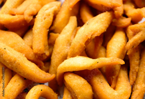 Close up Delicious Salty Spicy Namkeen Bhujia snack Texture. Spicy fried snacks. Abstract food background.