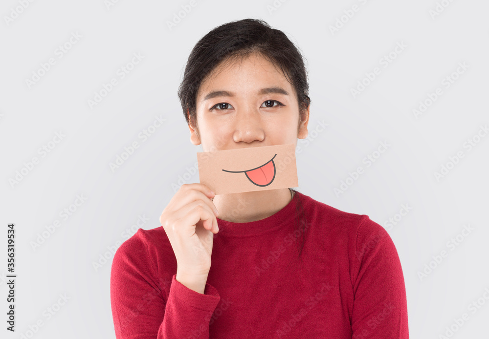 young asian woman holding happy emotion paper , advertising banner young asian woman holding happy emotion paper , advertising banner