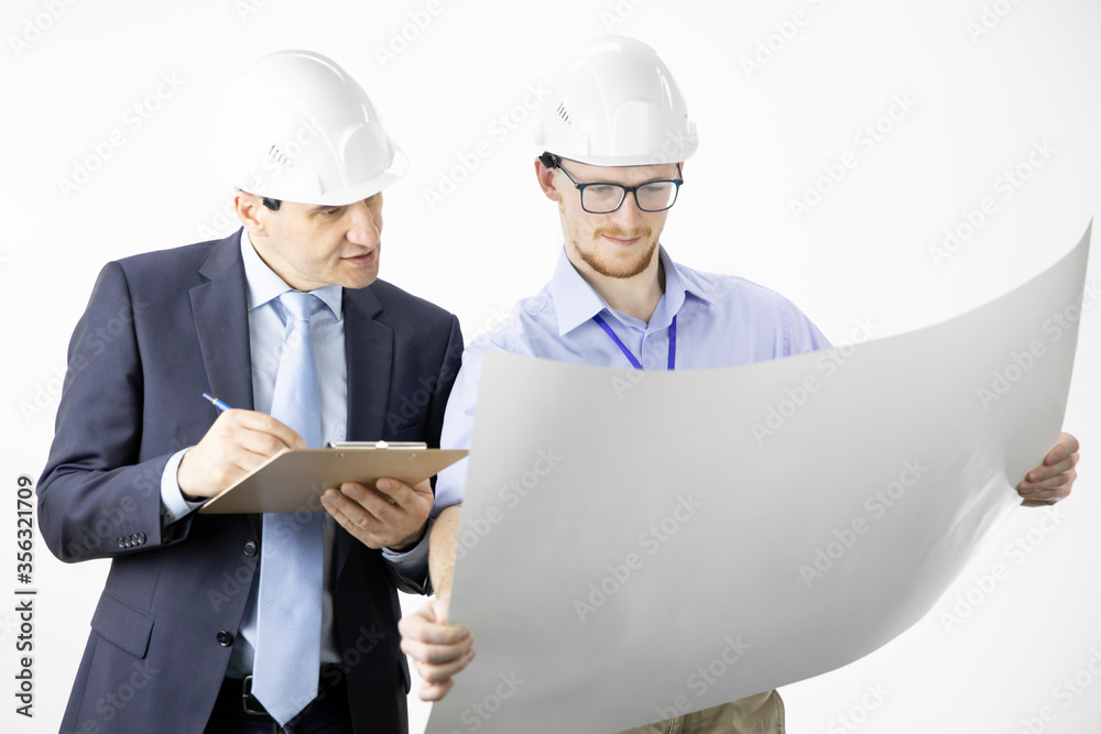 Architectural engineers working with blueprint documents marking edits on clipboard isolated on white background. Meeting, discussing, designing, planing concept. BIM, Industry construction Architectural engineers working with blueprint documents marking edits on clipboard isolated on white background. Meeting, discussing, designing, planing concept. BIM, Industry construction