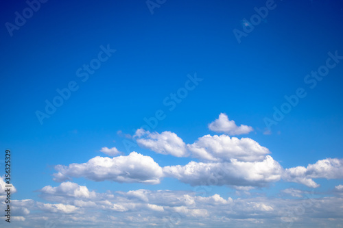 Blue sky with clouds. Blue sky background.