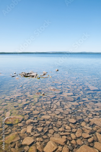 Uvildy lake with clear water and rocky bottom, Chelyabinsk region, Russian Federation photo