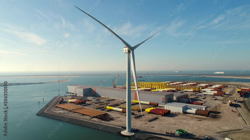AERIAL WS Wind turbine in port / Rotterdam, Zuid-Holland, Netherlands