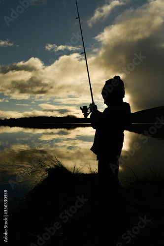 The fishing boy and the sunset. © Wild Bite